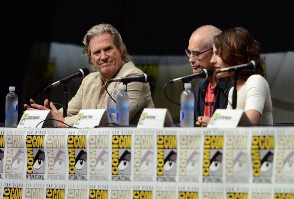 Jeff Bridges, left, Sergey Bodrov, center, and Antje Traue attend the "Seventh Son" panel on Day 4 of Comic-Con International on Saturday, July 20, 2013 in San Diego. (Photo by Jordan Strauss/Invision/AP)