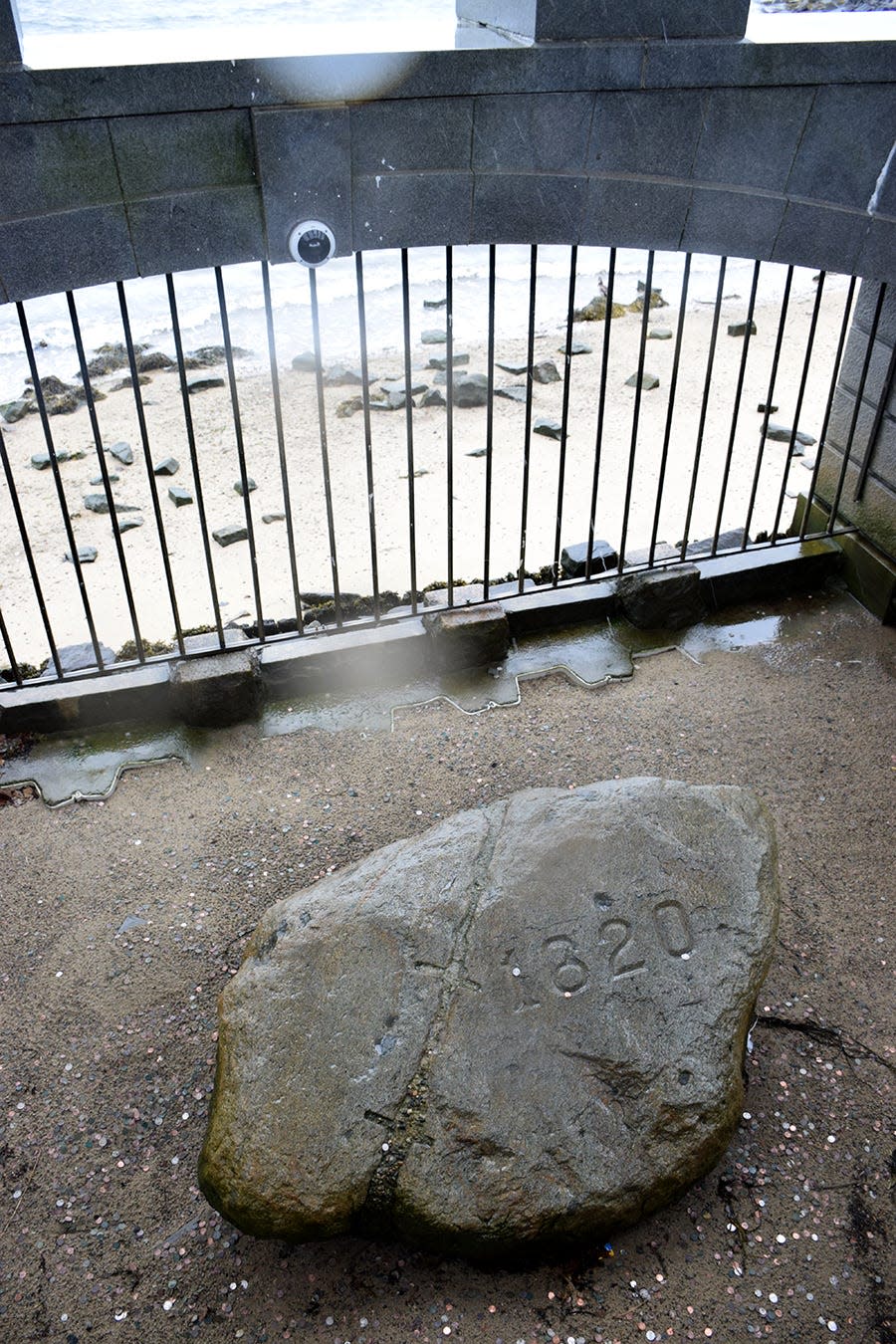 Plymouth Rock, believed to have been at the site of the Pilgrims’ landing in 1620, now is protected under a portico on the beach at Plymouth, Massachusetts.