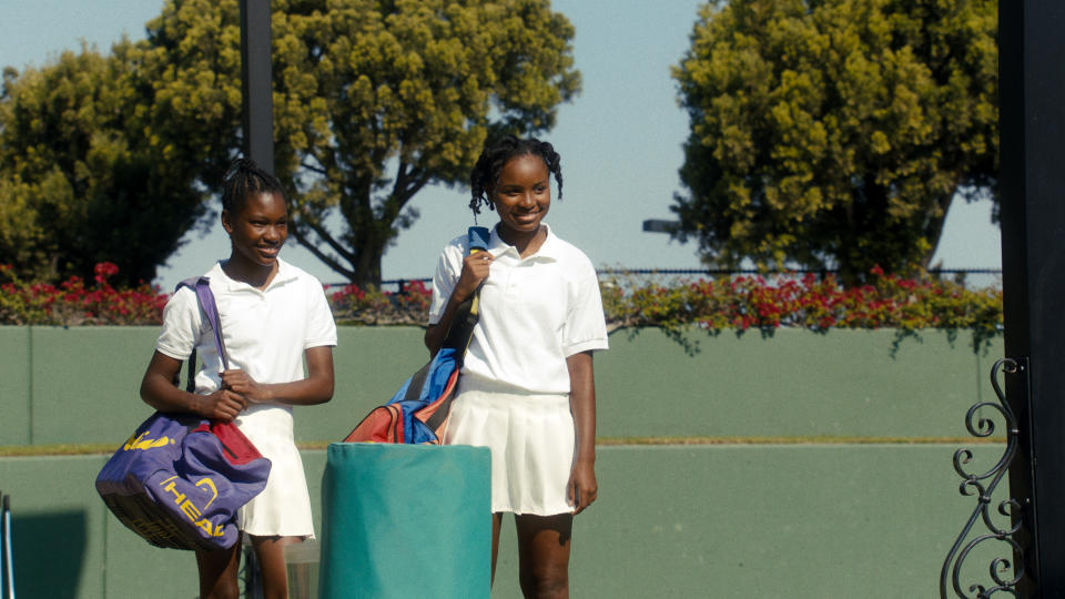 DEMI SINGLETON as Serena Williams and SANIYYA SIDNEY as Venus Williams in Warner Bros. Pictures’ inspiring drama “KING RICHARD,” a Warner Bros. Pictures release. (Courtesy of Warner Bros. Pictures)