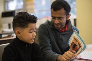 A student and tutor work together in a Reading Partners reading center (Photo credit: Reading Partners)