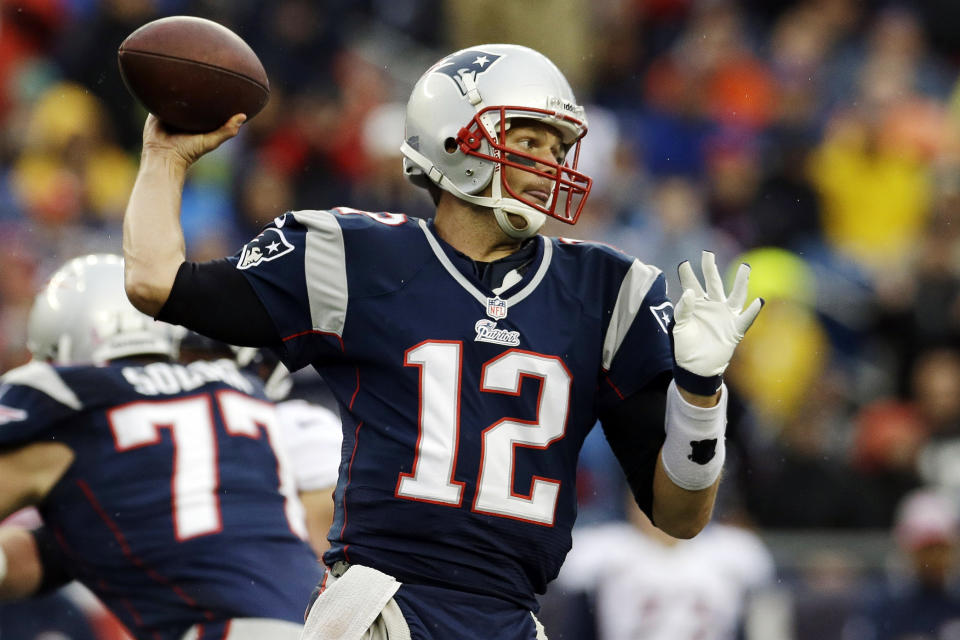 FILE - New England Patriots quarterback Tom Brady (12) passes against the Denver Broncos in the first quarter of an NFL football game on Oct. 7, 2012, in Foxborough, Mass. Brady, the seven-time Super Bowl winner with New England and Tampa Bay, announced his retirement from the NFL on Wednesday, Feb. 1, 2023 exactly one year after first saying his playing days were over. He leaves the NFL with more wins, yards passing and touchdowns than any other quarterback. (AP Photo/Elise Amendola, File)