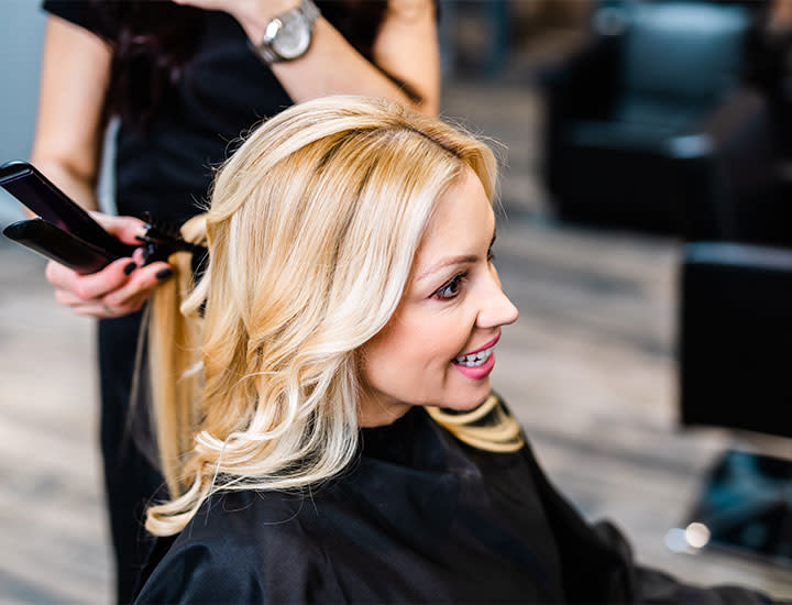 blonde-woman-smiling-hair-salon