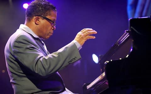 Herbie Hancock on stage at the Montreux Jazz Festival, Switzerland, in 2002 - Credit: AP Photo/Keystone, Fabrice Coffrini