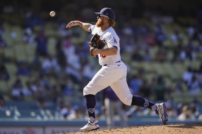 Los Angeles Dodgers relief pitcher Justin Turner throws during the ninth inning.