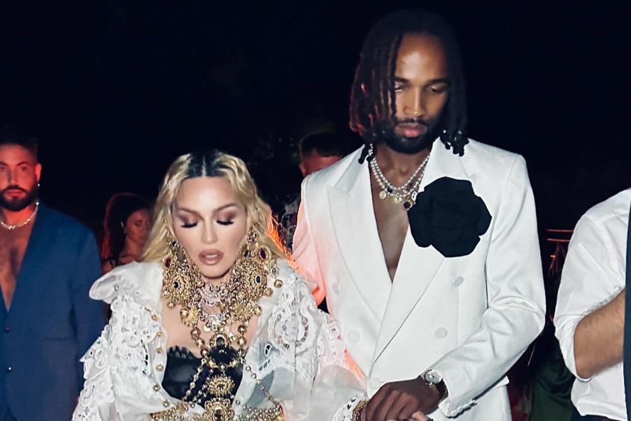 <p>Ricardo Gomes</p> Madonna and Akeem Morris in Italy 