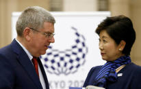 IOC President Thomas Bach (L) meets Tokyo Governor Yuriko Koike at Tokyo Metropolitan Government Building in Tokyo, Japan, October 18, 2016. REUTERS/Kim Kyung-Hoon