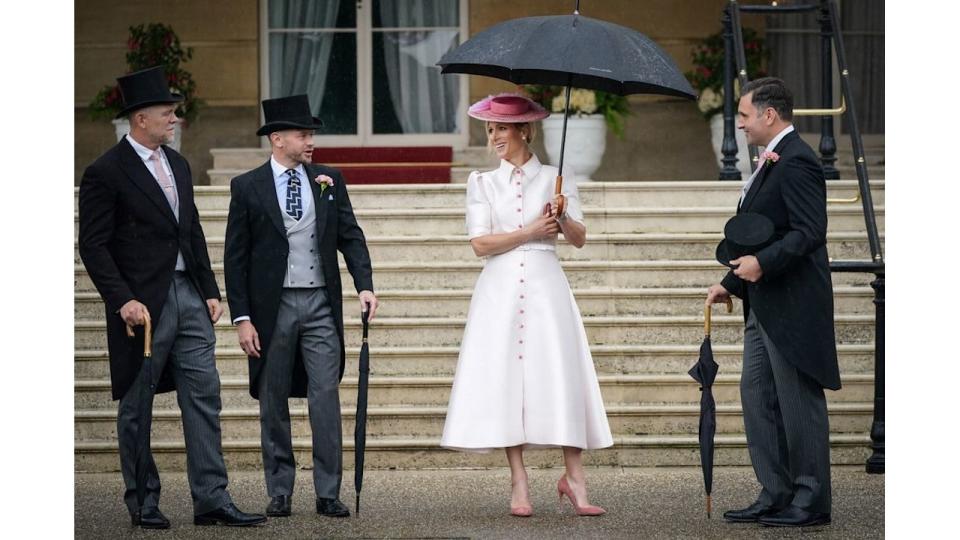 Zara Tindall channelling Mary Poppins under umbrella at Buckingham Palace Garden Party