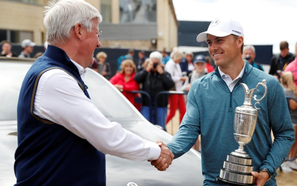 Jordan Spieth (right) handed back the Claret Jug on Monday but will be hoping to win it back come Sunday  - REUTERS