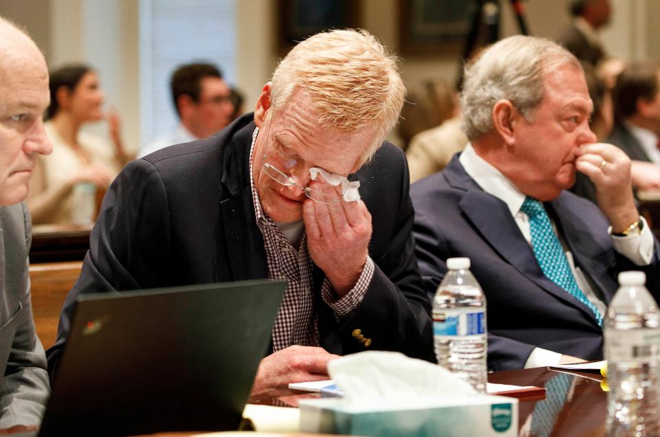 Alex Murdaugh becomes emotional after seeing his family in the courtroom as opening statements begin in his double murder trial at the Colleton County Courthouse in Walterboro, South Carolina, Wednesday, Jan. 25, 2023.