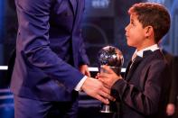 <p>Cristiano Ronaldo’s son Cristiano junior celebrates with his dad </p>