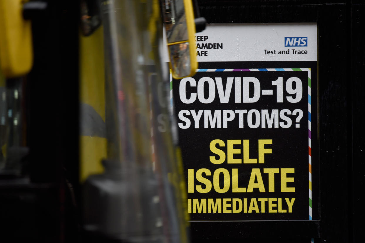 LONDON, ENGLAND - OCTOBER 29: A coronavirus (Covid-19) sign in central London on October 29, 2020. The coronavirus pandemic has reached a âcritical stageâ in England with 96,000 new infections in a single day and infections doubling every nine days, according to the Imperial College London (ICL) on Thursday. Health Secretary Matt Hancock announced that 16 more areas in England will move into Tier 2 restrictions, the second highest level, beginning Saturday. (Photo by Kate Green/Anadolu Agency via Getty Images)