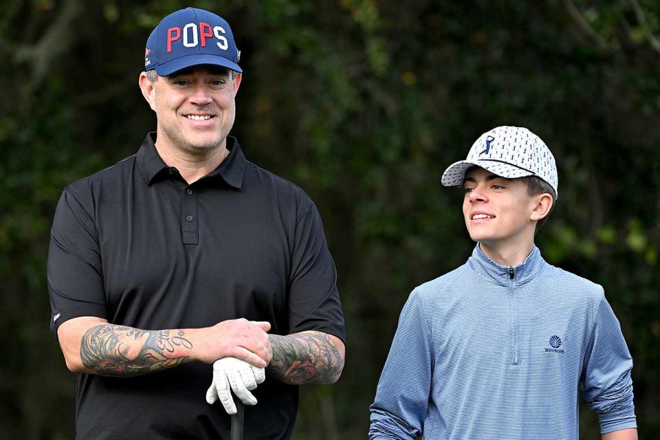 <p>Ben Jared/PGA TOUR via Getty </p> Carson Daly and his son Jackson