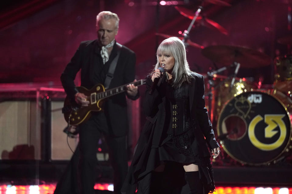 Inductees Neil Giraldo, left, and Pat Benatar perform during the Rock & Roll Hall of Fame Induction Ceremony on Saturday, Nov. 5, 2022, at the Microsoft Theater in Los Angeles. (AP Photo/Chris Pizzello)