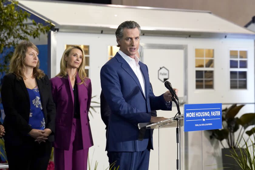 California Gov. Gavin Newsom discusses his plans to build 1,200 small homes across the state to reduce homelessness, during the first of a four-day tour of the state in Sacramento Calif., on Thursday, March 16, 2023. (AP Photo/Rich Pedroncelli)