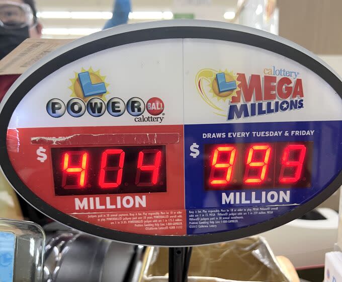 The Mega Millions jackpot has grown to more than $1 billion dollars, with a ticket shown from 168 Market in Hacienda Heights on Friday, Jan. 13, 2023.