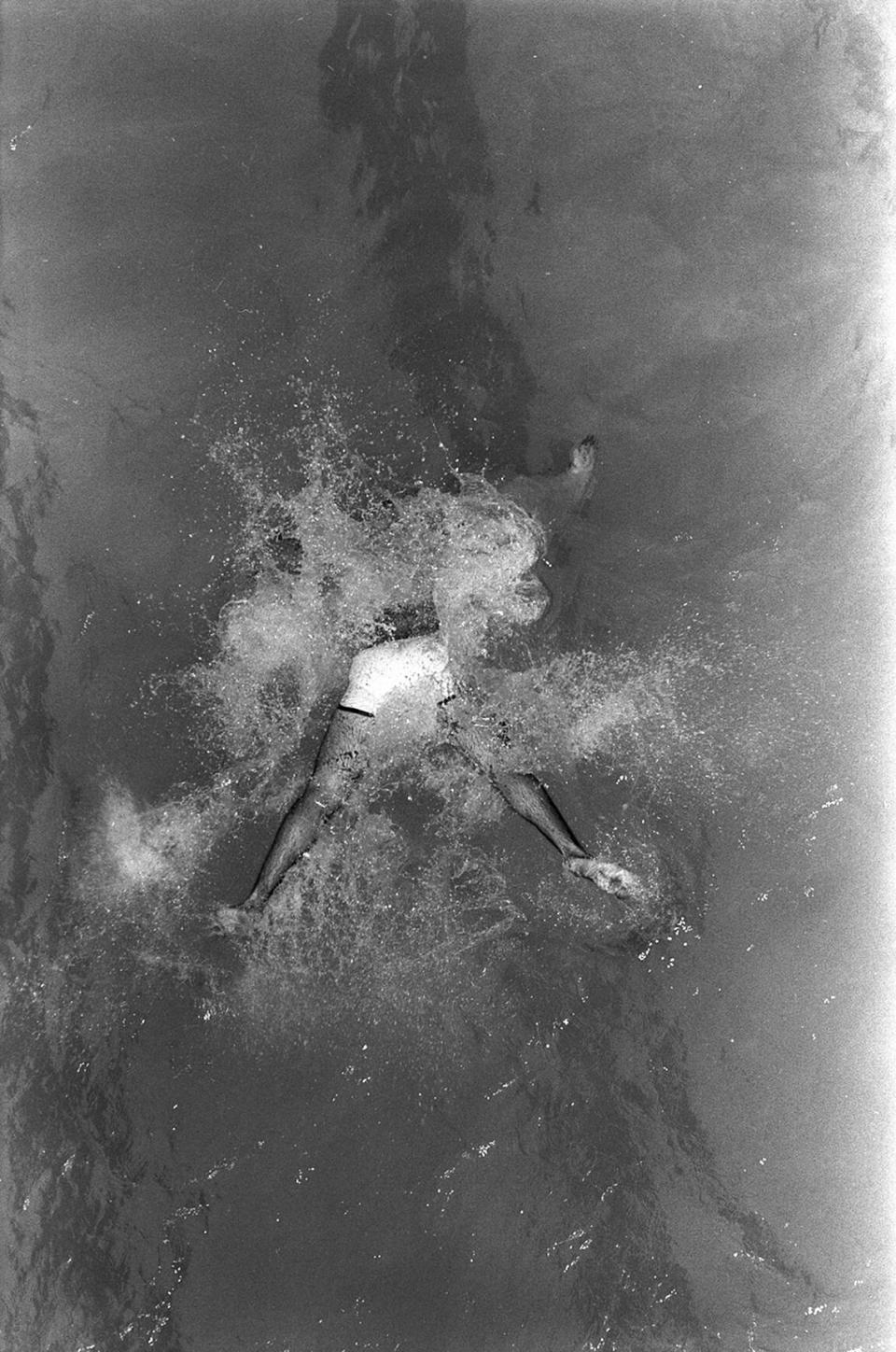 June 27, 1980: A University of Texas at Arlington student participates in the non-invitational belly flop competition on campus during a heat wave. Jerry W. Hoefer/Fort Worth Star-Telegram archive/UT Arlington Special Collections