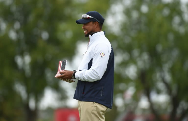 Team USA vice-captain Tiger Woods smiles during a practice round ahead of the 41st Ryder Cup at Hazeltine National Golf Course in Chaska, Minnesota