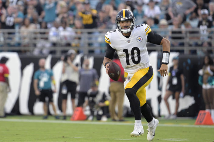 FILE - Pittsburgh Steelers quarterback Mitch Trubisky (10) scrambles for yardage during the first half of a preseason NFL football game against the Jacksonville Jaguars, Saturday, Aug. 20, 2022, in Jacksonville, Fla. Trubisky is battling with fellow Steeler quarterbacks Kenny Pickett for the right to replace longtime starting quarterback Ben Roethlisberger, who retired in January. (AP Photo/Phelan M. Ebenhack, File)