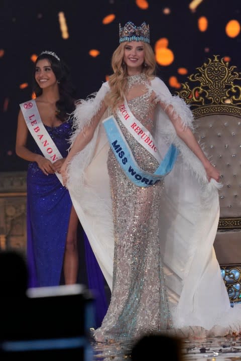 Krystyna Pyszková of Czech Republic walks on stage after she was crowned Miss World in Mumbai, India, Saturday, Mar. 9, 2024. (AP Photo/Rajanish Kakade)