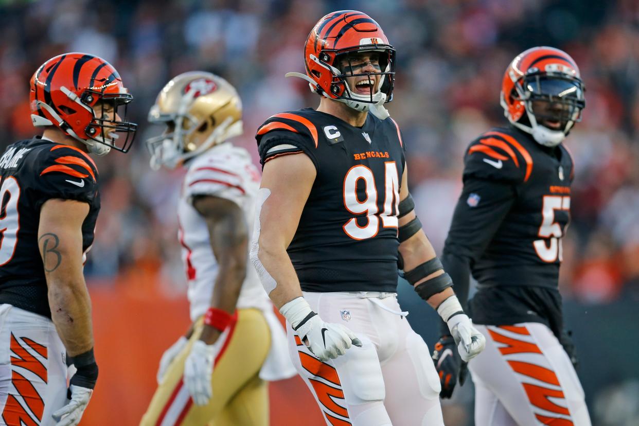 Cincinnati Bengals defensive end Sam Hubbard (94) celebrates a stop in the first quarter of the NFL Week 14 game between the Cincinnati Bengals and the San Francisco 49ers at Paul Brown Stadium in downtown Cincinnati on Sunday, Dec. 12, 2021.