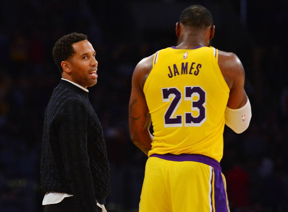 March 6, 2020; Los Angeles, California, USA; Los Angeles Lakers forward LeBron James (23) speaks with businessman Maverick Carter (left) during a stoppage in play in the second half at Staples Center. Mandatory Credit: Gary A. Vasquez-USA TODAY Sports