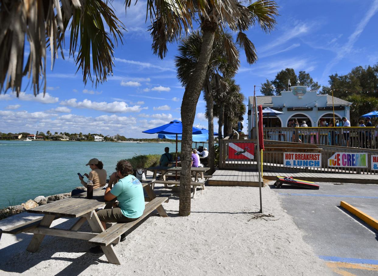 Patrons at  Jetty Jack's Refreshment Deck at the Venice South Jetty get a nice view of the Intracoastal Waterway. 
In February The Venice City Council passed a temporary ordinance allowing Jetty Jack's and the Venice Pilot House to sell alcohol during daylight hours. On Nov. 29, the board approved the first reading of an ordinance that removes a sunset clause and would allow sales to be permanent.