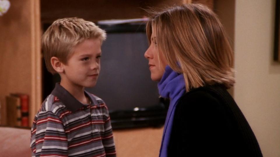  Cole Sprouse as Ben Gellar and Jennifer Aniston as Rachel Green on Friends. 