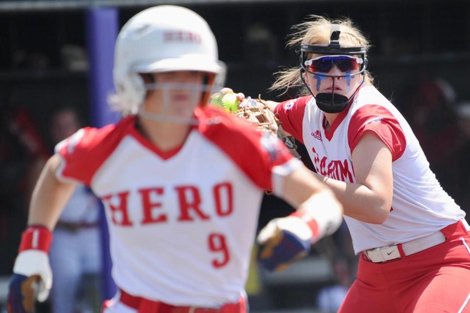 Coahoma's Hannah Wells throws to first base against Holliday on Saturday, May 28, 2022 at Poly Wells Field in Abilene.