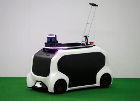 Toyota Motor Corp. demonstrates FRS field event support robot which will be used to support the Tokyo 2020 Olympic and Paralympic Games, during a press preview in Tokyo