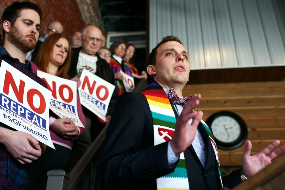 The Rev. Caleb Lines of South Street Christian Church speaks at One Springfield's event opposing the effort to repeal language including sexual orientation and gender identity in Springfield's nondiscrimination ordinance during an event organized by One Springfield at The Old Glass Place in downtown Springfield on Thursday, Feb. 26, 2015.
