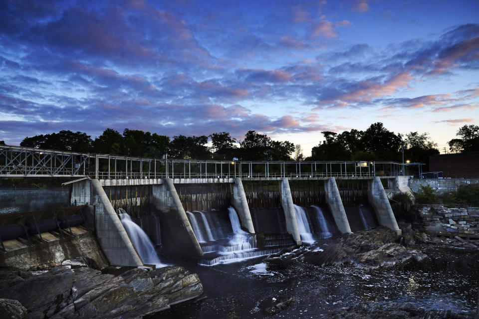 FILE - The Weston Dam holds back the Kennebec River on Sept. 14, 2021, in Skowhegan, Maine. The federal government ruled Monday, March 20, 2023, that the last wild Atlantic salmon in the country can coexist with dams on a Maine river, dealing a blow to environmentalists who have long sought to remove them. (AP Photo/Robert F. Bukaty, File)