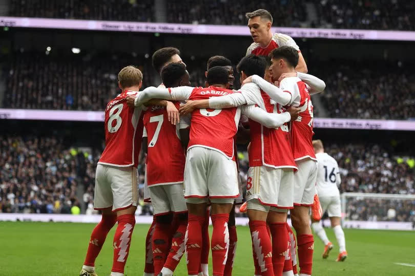 Arsenal players celebrated against Tottenham.