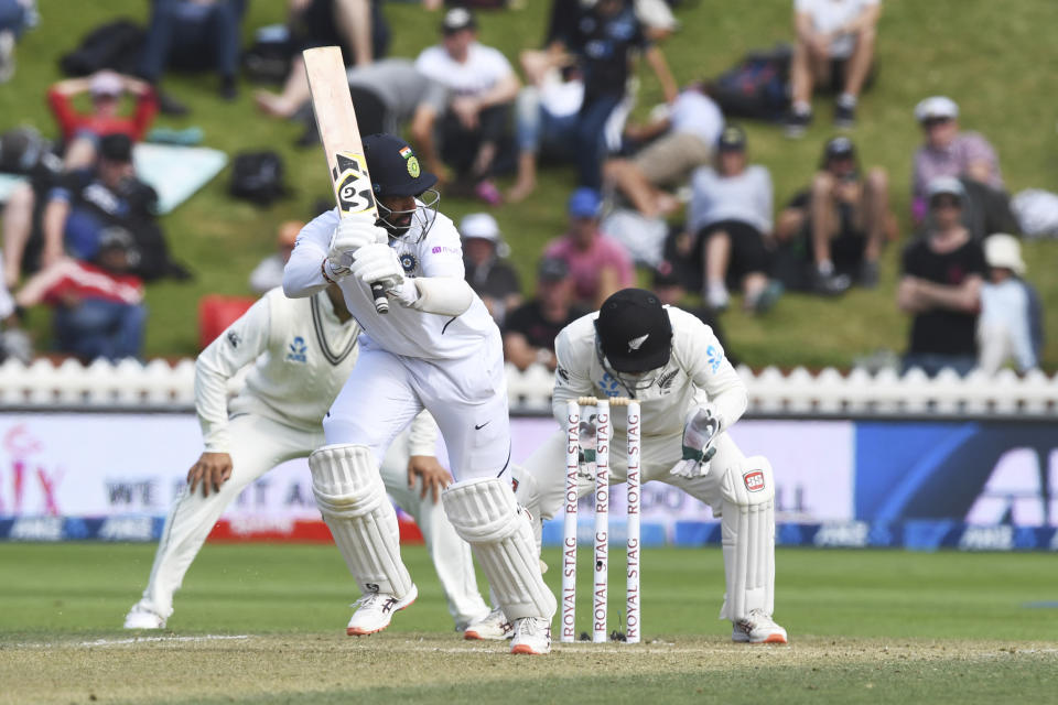 India's Cheteshwar Pujara bats against New Zealand during the first cricket test between India and New Zealand at the Basin Reserve in Wellington, New Zealand, Sunday, Feb. 23, 2020. (AP Photo/Ross Setford)