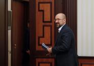 Ukraine's Prime Minister Shmygal leaves after an interview in Kiev