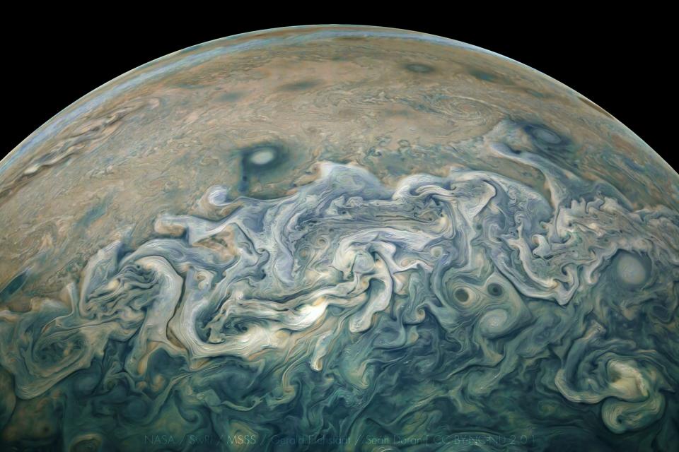 jupiter blue white green swirling clouds