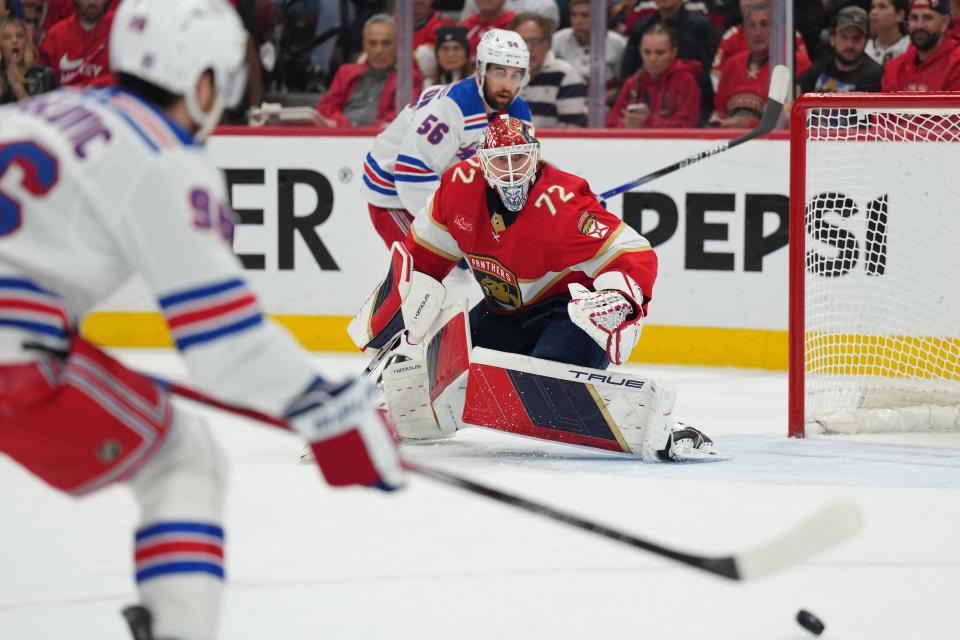 Jun 1, 2024; Sunrise, Florida, USA; Florida Panthers goaltender Sergei Bobrovsky (72) keeps an eye on the puck as New York Rangers center Jack Roslovic (96) closes in during the first period in game six of the Eastern Conference Final of the 2024 Stanley Cup Playoffs at Amerant Bank Arena. Mandatory Credit: Jim Rassol-USA TODAY Sports