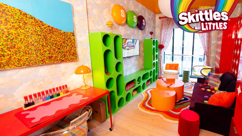 Colorful living room in Skittles Littles apartment, designed by Dani Klaric.