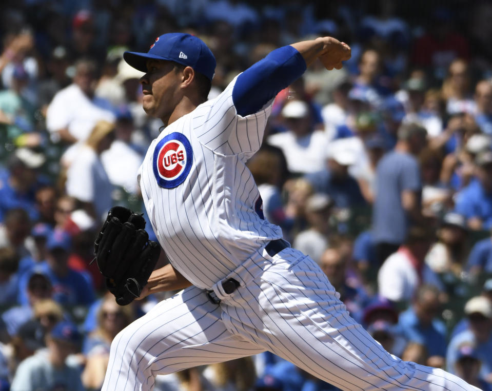 Chicago Cubs starting pitcher Jose Quintana (62) throws the ball against the Milwaukee Brewers during the first inning of a baseball game, Friday, Aug. 2, 2019, in Chicago. (AP Photo/David Banks)