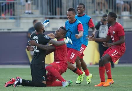 Jul 25, 2015; Chester, PA, USA; Panama goalkeeper Luis Mejia (12) celebrates with his team after a victory against the United States in the CONCACAF Gold Cup third place match at PPL Park. Mandatory Credit: Bill Streicher-USA TODAY Sports