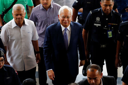 Former Malaysia's Prime Minister Najib Razak arrives at Kuala Lumpur High Court in Kuala Lumpur, Malaysia April 3, 2019. REUTERS/Lai Seng Sin