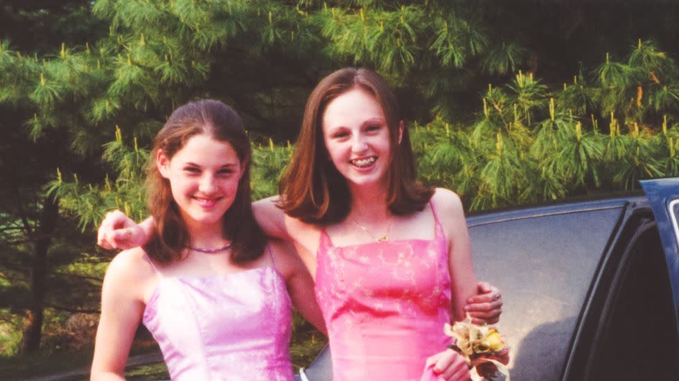 two women in dresses