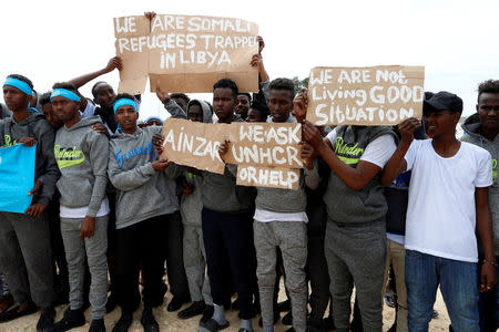 Migrants are seen at a detention centre in Tripoli, Libya April 4, 2019. REUTERS/Ismail Zitouny