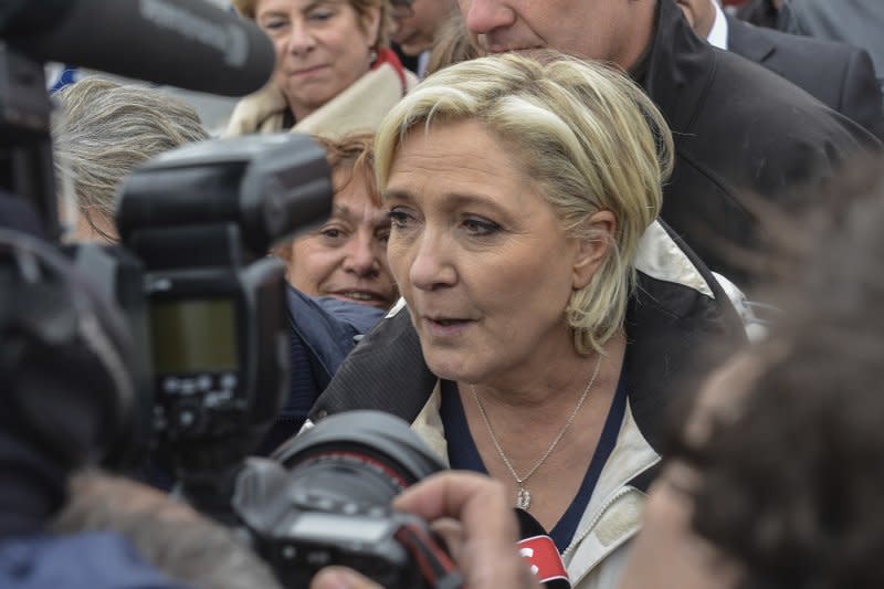 法國總統大選：極右派候選人勒潘突然現身對手馬克宏家鄉爭取藍領選票（AP）
