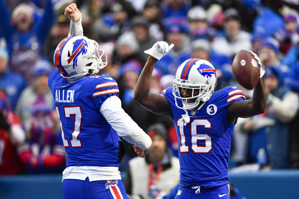 Buffalo Bills wide receiver John Brown (16) celebrates his touchdown with quarterback Josh Allen (17) during the second half of an NFL football game against the New England Patriots, Sunday, Jan. 8, 2023, in Orchard Park. (AP Photo/Adrian Kraus)