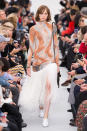 <p><i>Orange and white swirl dress with feather skirt from the SS18 Céline collection. (Photo: ImaxTree) </i></p>