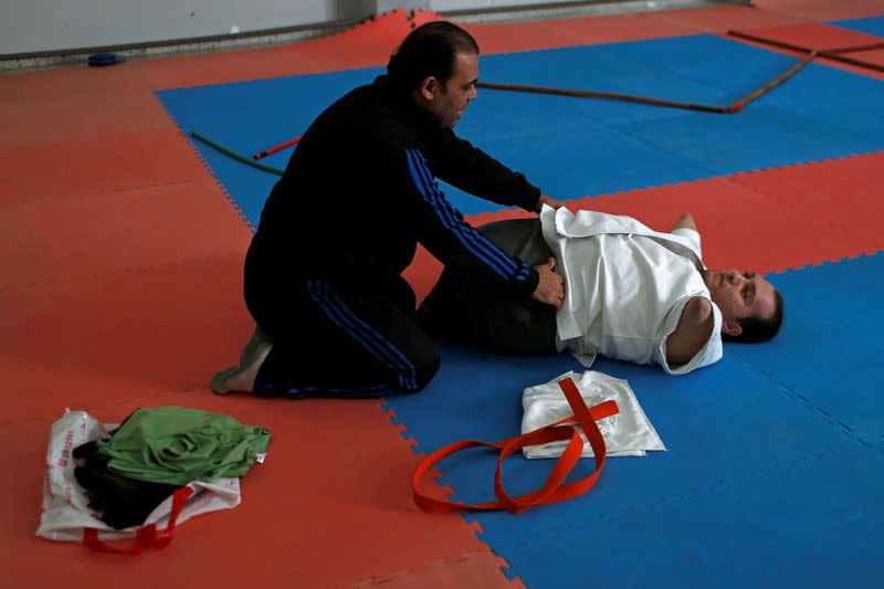 Gaza man with disabilities conquers karate