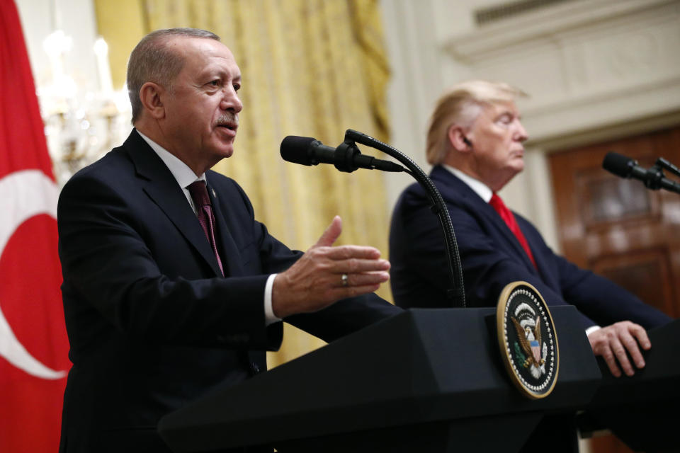 Turkish President Recep Tayyip Erdogan speaks at a news conference alongside President Donald Trump in the East Room of the White House, Wednesday, Nov. 13, 2019, in Washington. (AP Photo/Patrick Semansky)