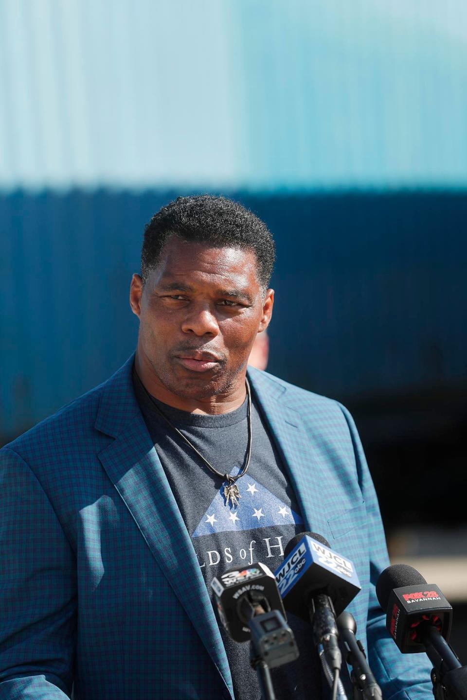 Herschel Walker, Republican candidate for Georgia Senate, speaks during a press conference at the Georgia Ports Authority.