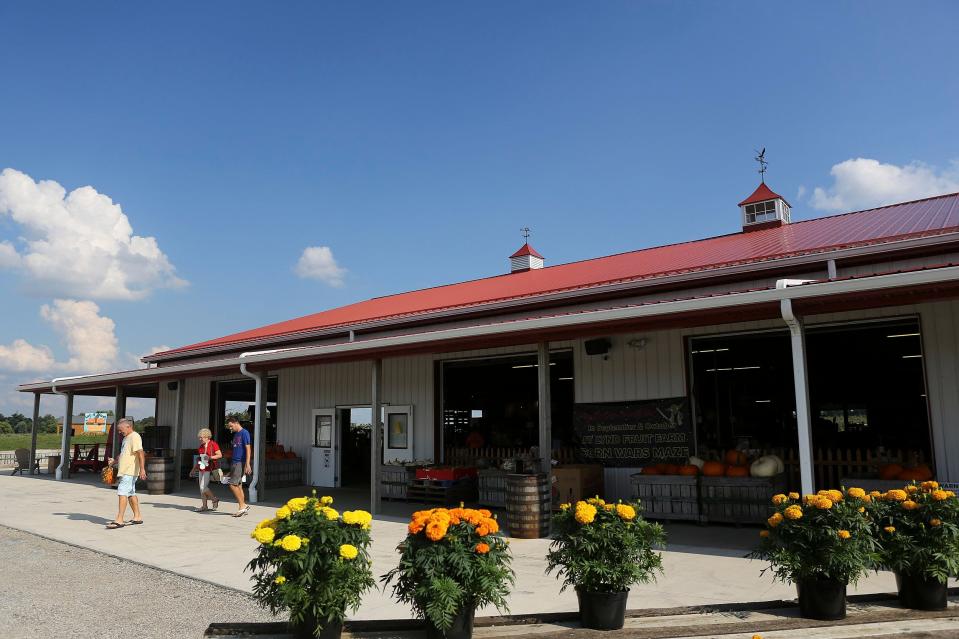 Customers leave Lynd Fruit Farm on Tuesday, September 4, 2018.