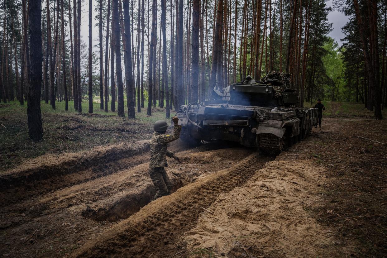 A Ukrainian serviceman practises an infantry tactic during a military exercise in Kharkiv (AFP via Getty Images)